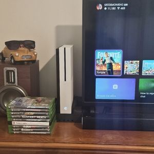 Xbox one s 1TB and 9 games.
